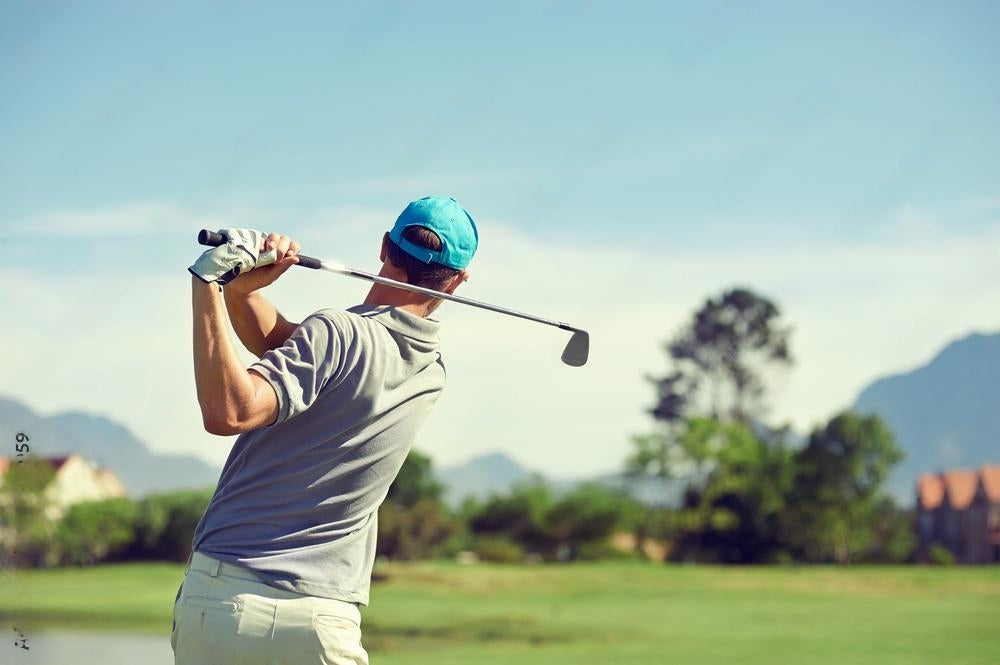 Active man swinging golf club on course, representing restored energy and endurance from testosterone replacement therapy for men over 40. Optimized for search terms like “best testosterone therapy for men over 40,” “trt online purchase active lifestyle,” “TRT vitality & performance online.”