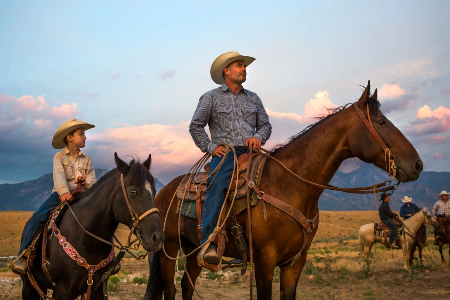 american Father and son on horseback at sunset, symbolizing strength, legacy, and natural masculinity—just like enclomiphene supports testosterone and fertility.